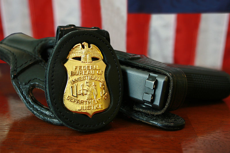 FBI "bagde and gun". Foto: FBI, Wikimedia, PublicDomain