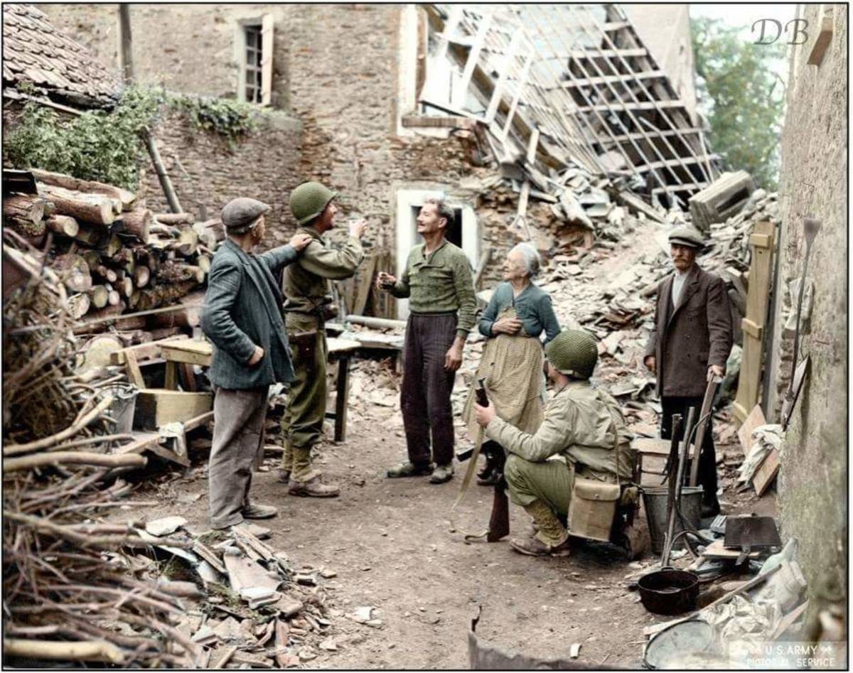 US soldiers greeting French citizens at St. Lo