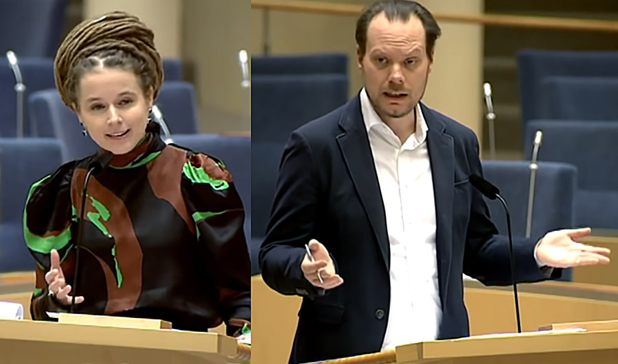 Amanda Lind (MP) och Martin Kinnunen (SD) diskuterar i Riksdagen 11 mars 2021. Foto: Riksdagen.se