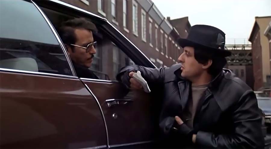 Sylvester Stallone (th) och Joe Spinell i filmen Rocky (1976). Foto: Winkler Films